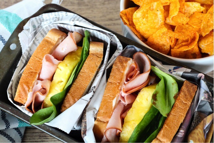 Hawaiian Barbecue Sandwich Recipe. Ingredients list and directions for how to make a Hawaiian barbecue sandwich with ham and pineapple. A fun + flavorful sandwich recipe for spring + summer.