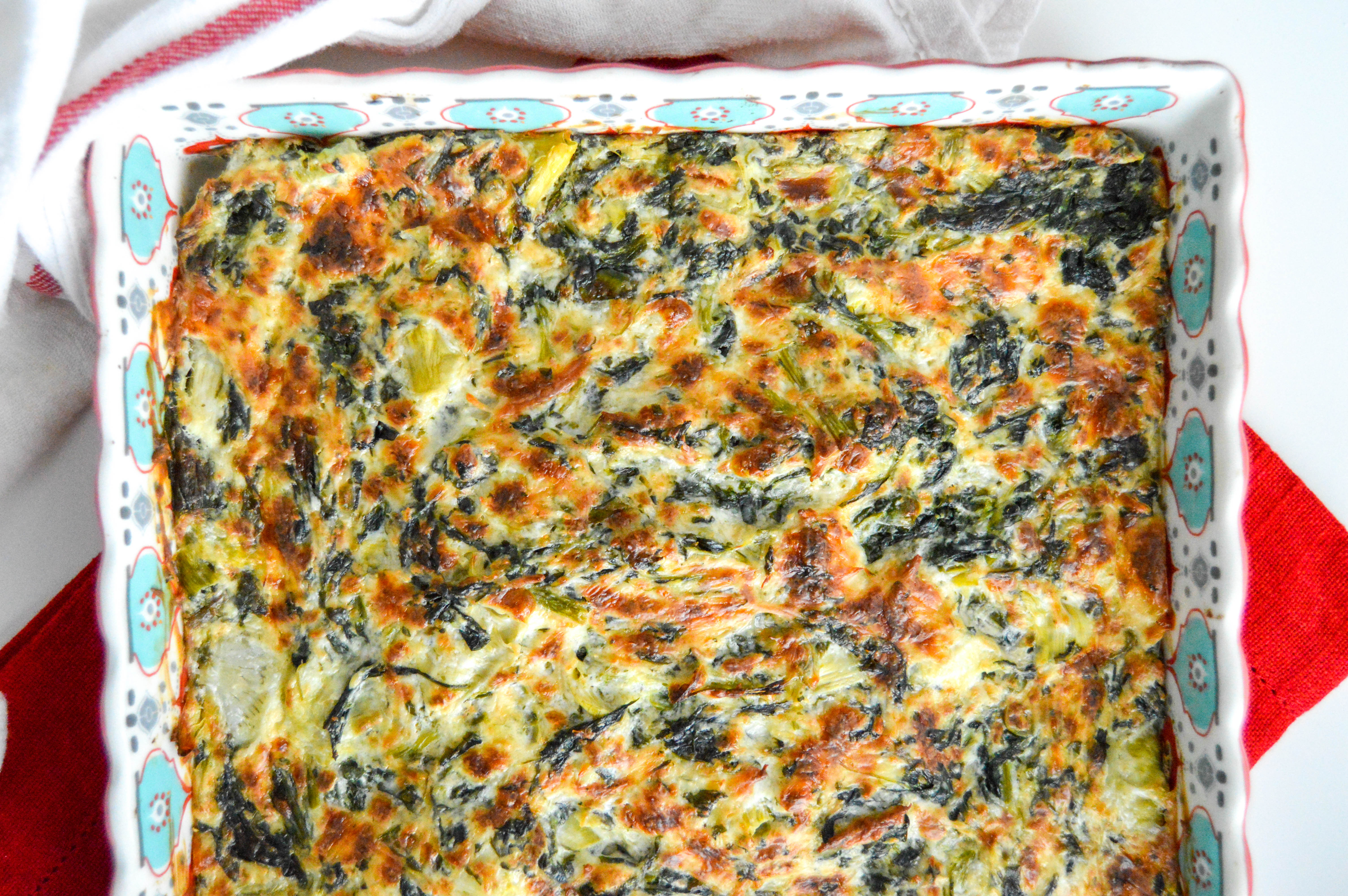Oven baked cheesy spinach artichoke dip.