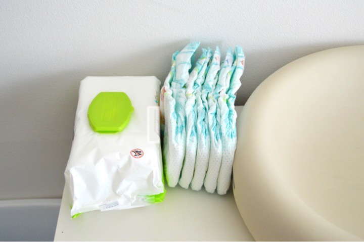 Have diapers and wipes accessible | Tips for how to make a practical diaper changing station. Changing table ideas like: repurpose a dresser, get a Diaper Genie, buy diapers and wipes in bulk, baby changing pad + more ideas for your baby's nursery. DIY dresser changing table hack. Tips and tricks for when baby comes like where to go shopping for a diaper pail.