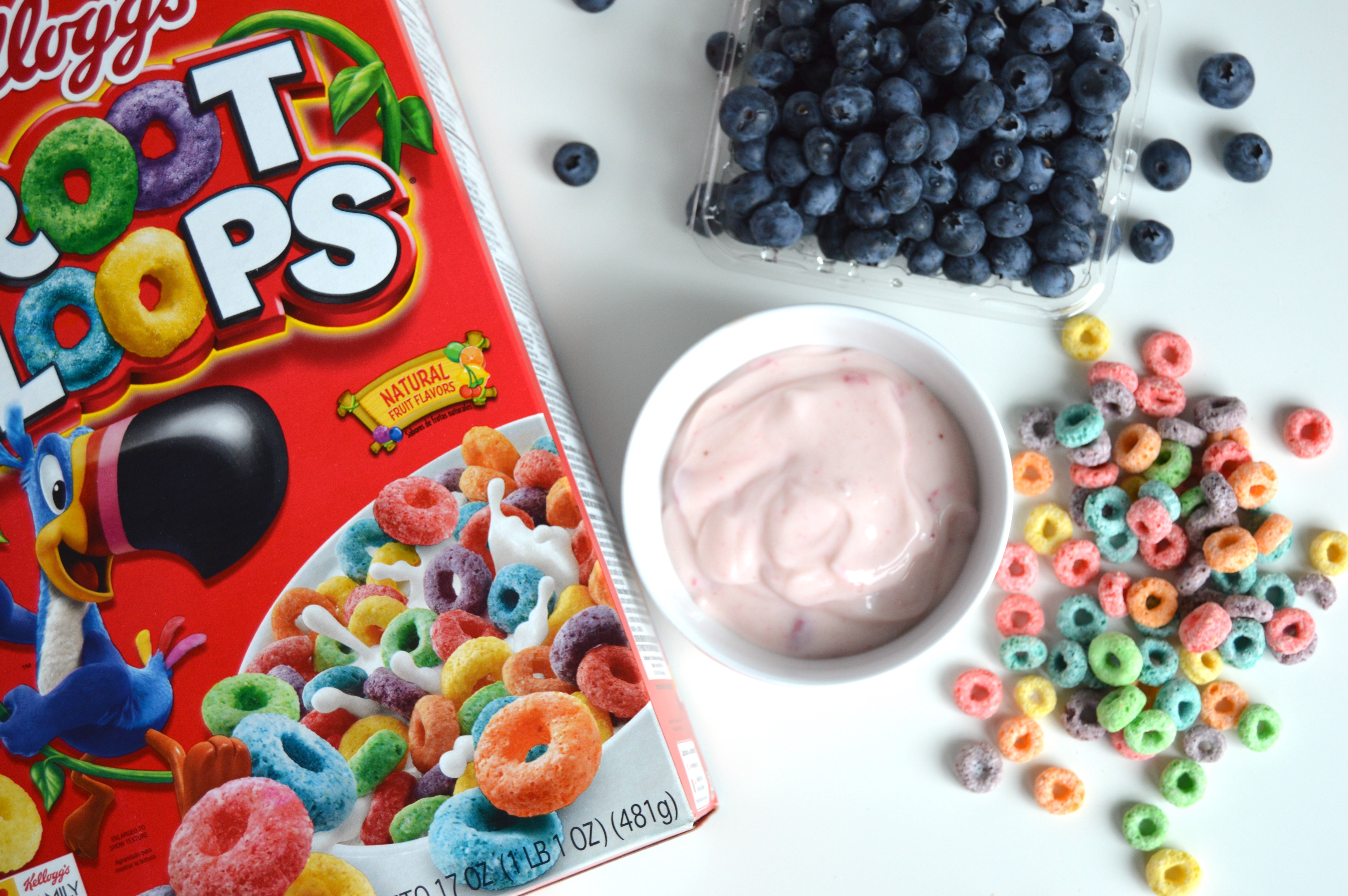 Froot Loops Cereal Yogurt Parfait ingredients: Froot Loops, strawberry yogurt, and blueberries