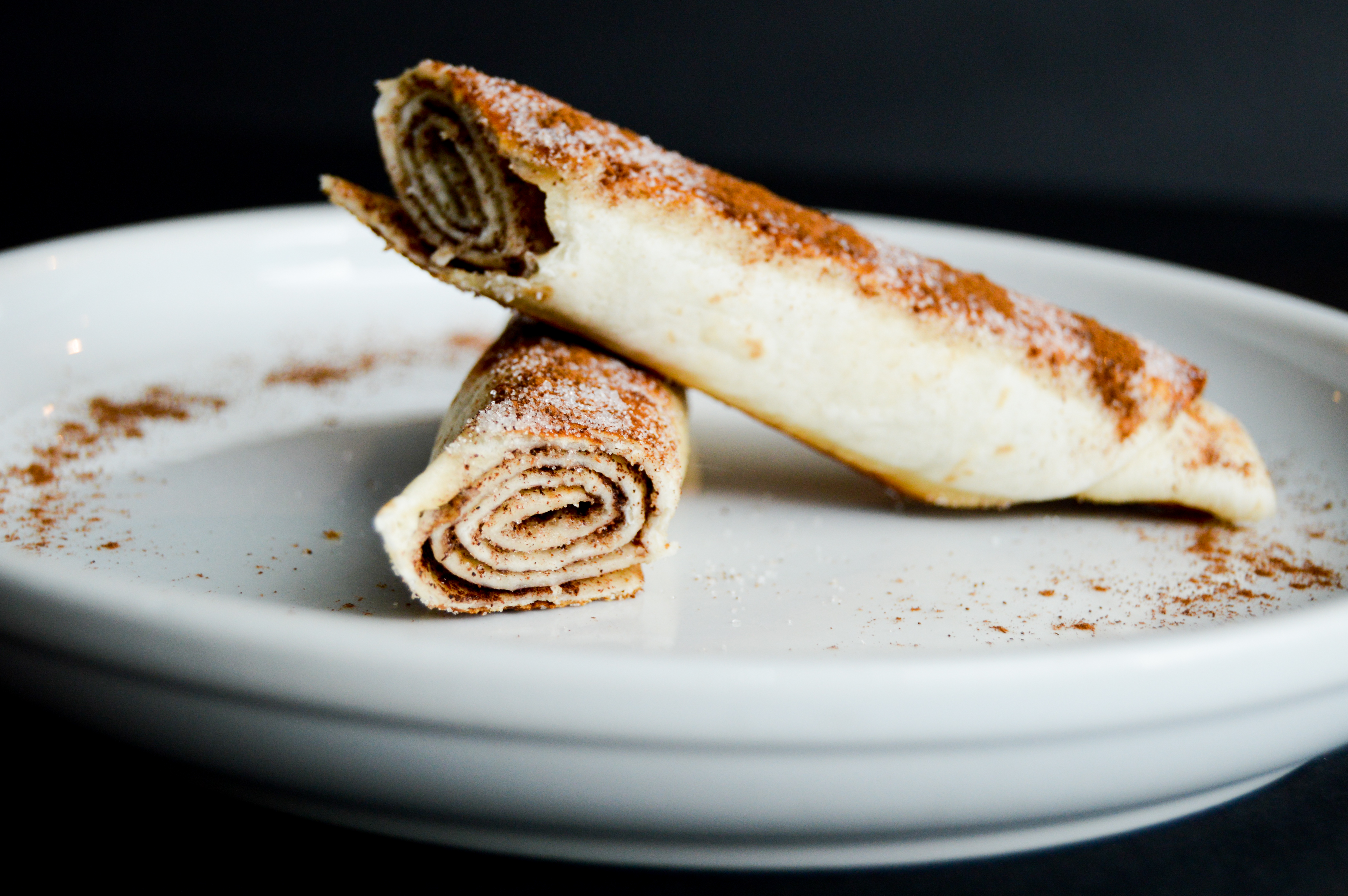 Cinnamon sugar tortilla roll ups recipe inspired by churros. These easy churro pinwheels make a tasty snack, appetizer, or treat for Cinco de Mayo. Simple 4 ingredient recipe that the kids will love! 