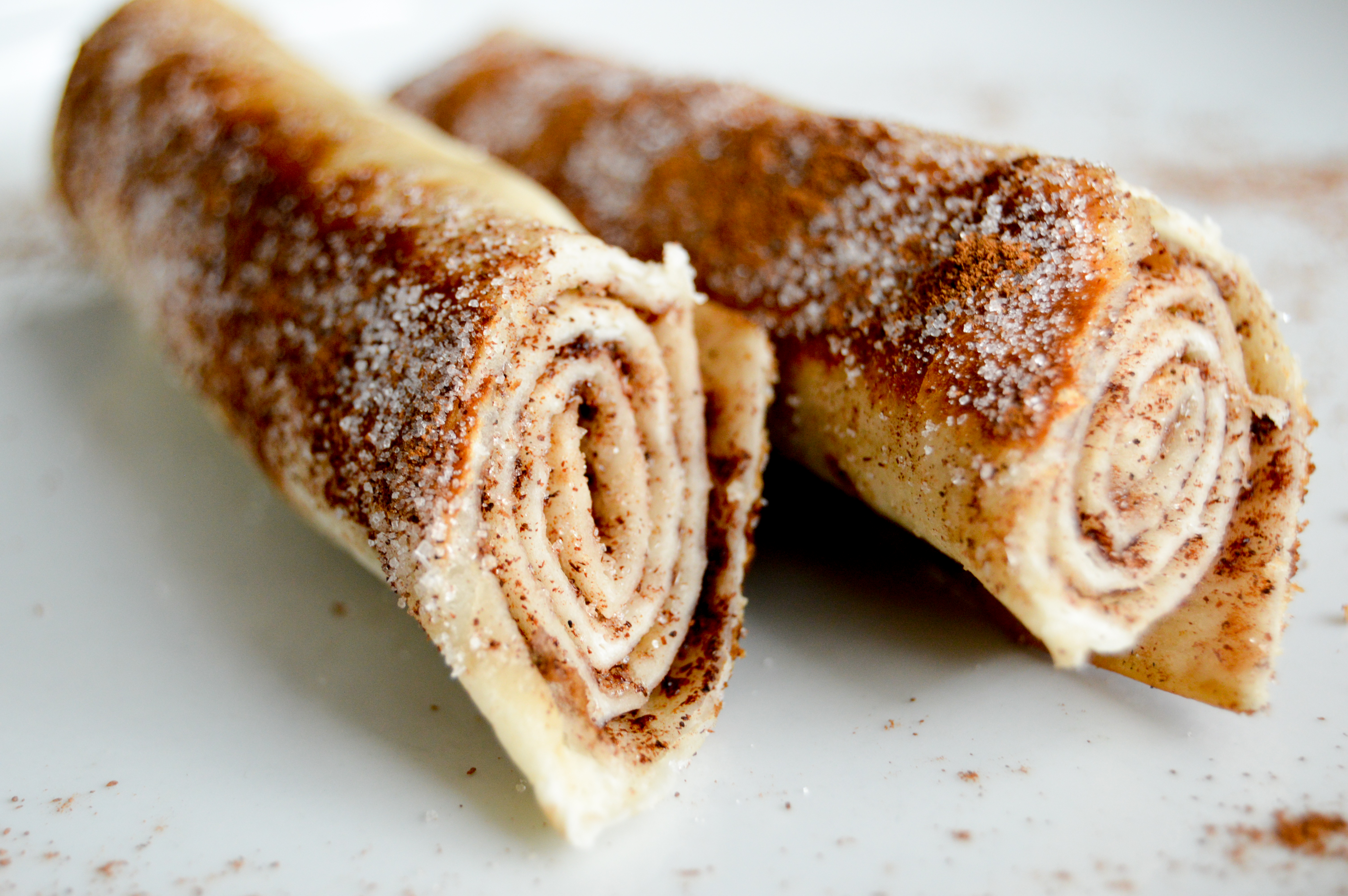 Cinnamon sugar tortilla roll ups recipe inspired by churros. These easy churro pinwheels make a tasty snack, appetizer, or treat for Cinco de Mayo. Simple 4 ingredient recipe that the kids will love! 