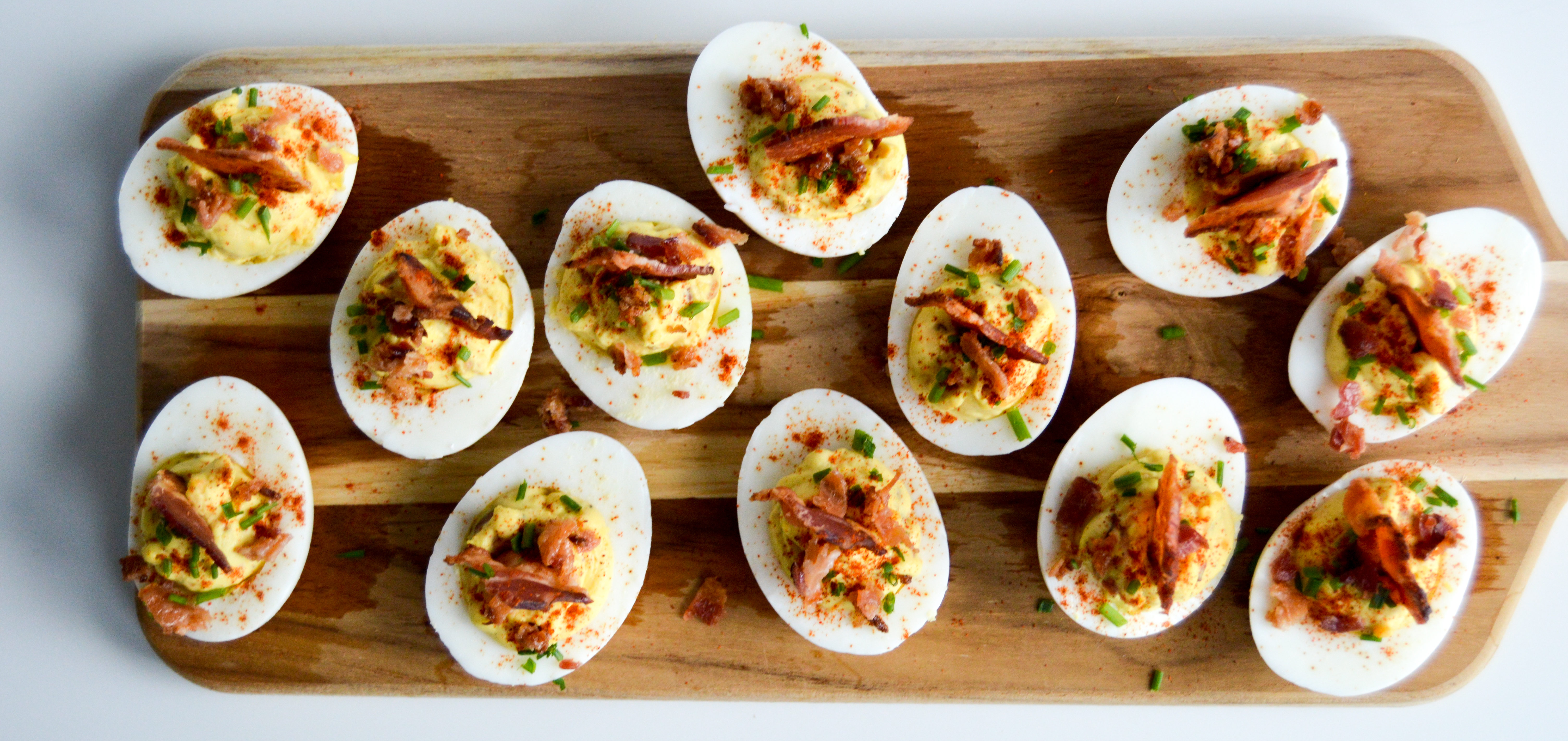 Bacon Loaded Deviled Eggs Recipe - Party food and appetizer