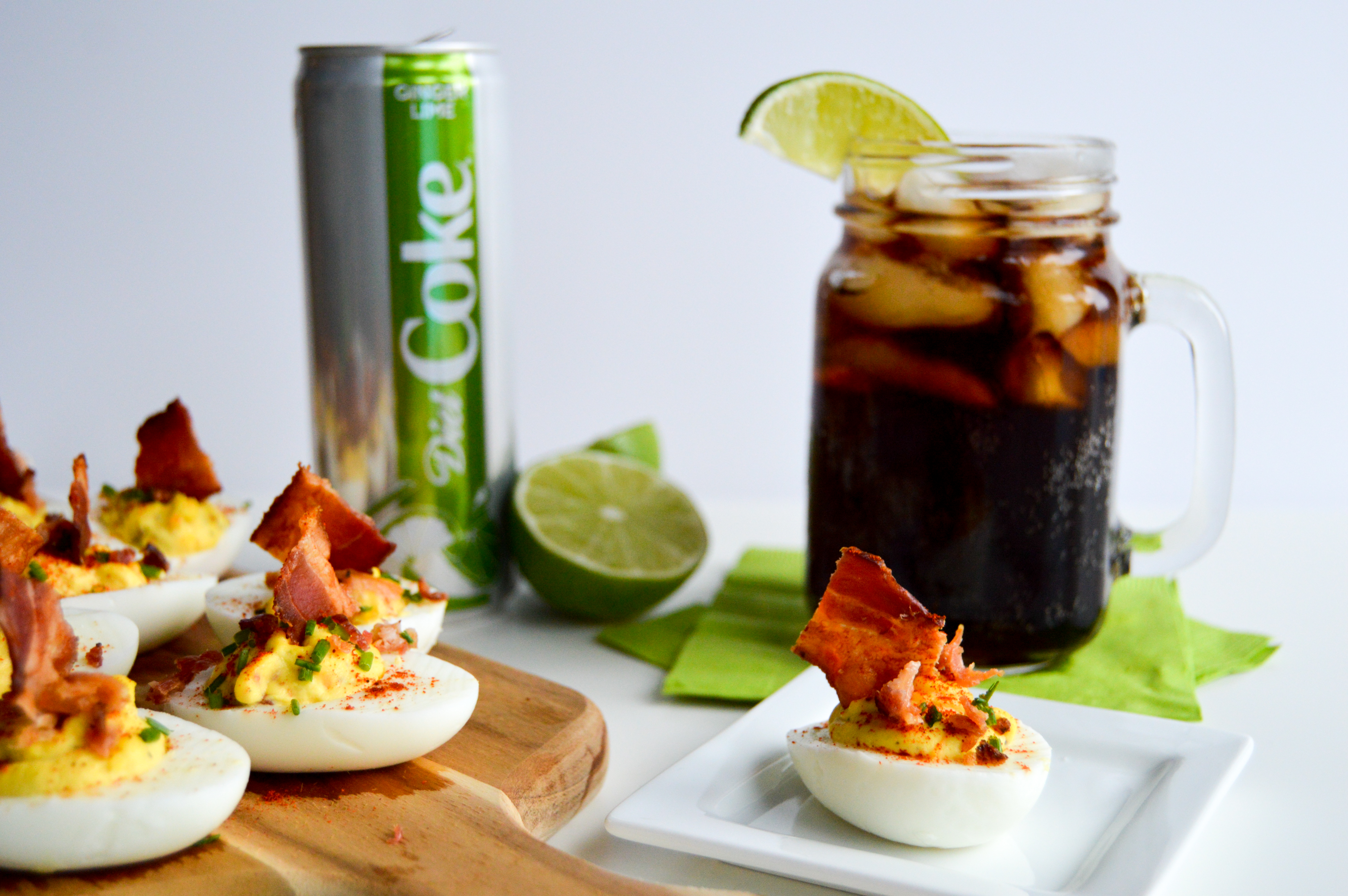 Yummy recipe for bacon loaded deviled eggs to pair with a chilled Diet Coke Ginger Lime. Makes for a bacon bite explosion perfect for your next party!