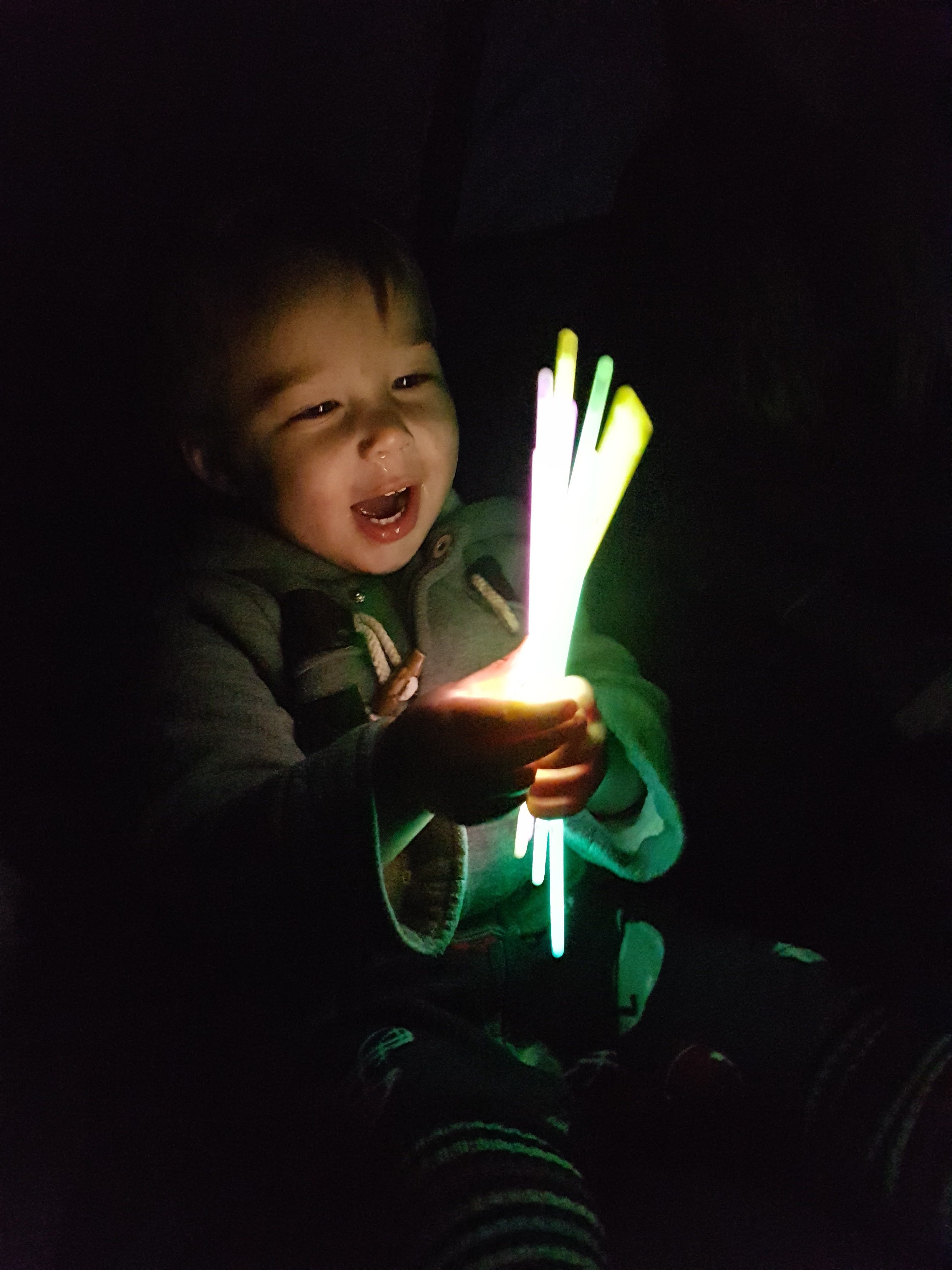 Fun Camping Activities for Toddlers #3 - Play with glow sticks in the tent before bed