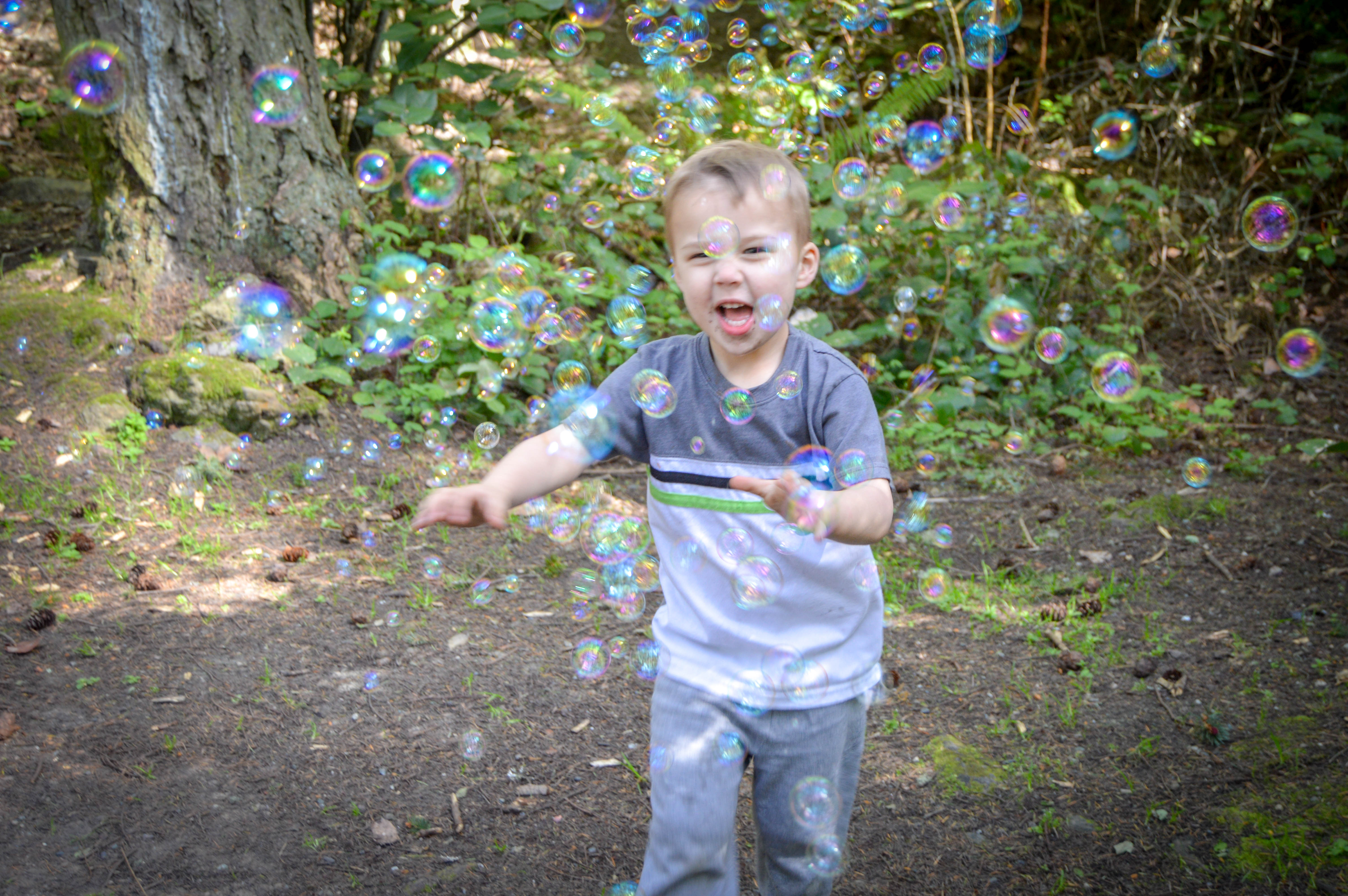 Fun Camping Activities for Toddlers #4 - Play with a bubble machine