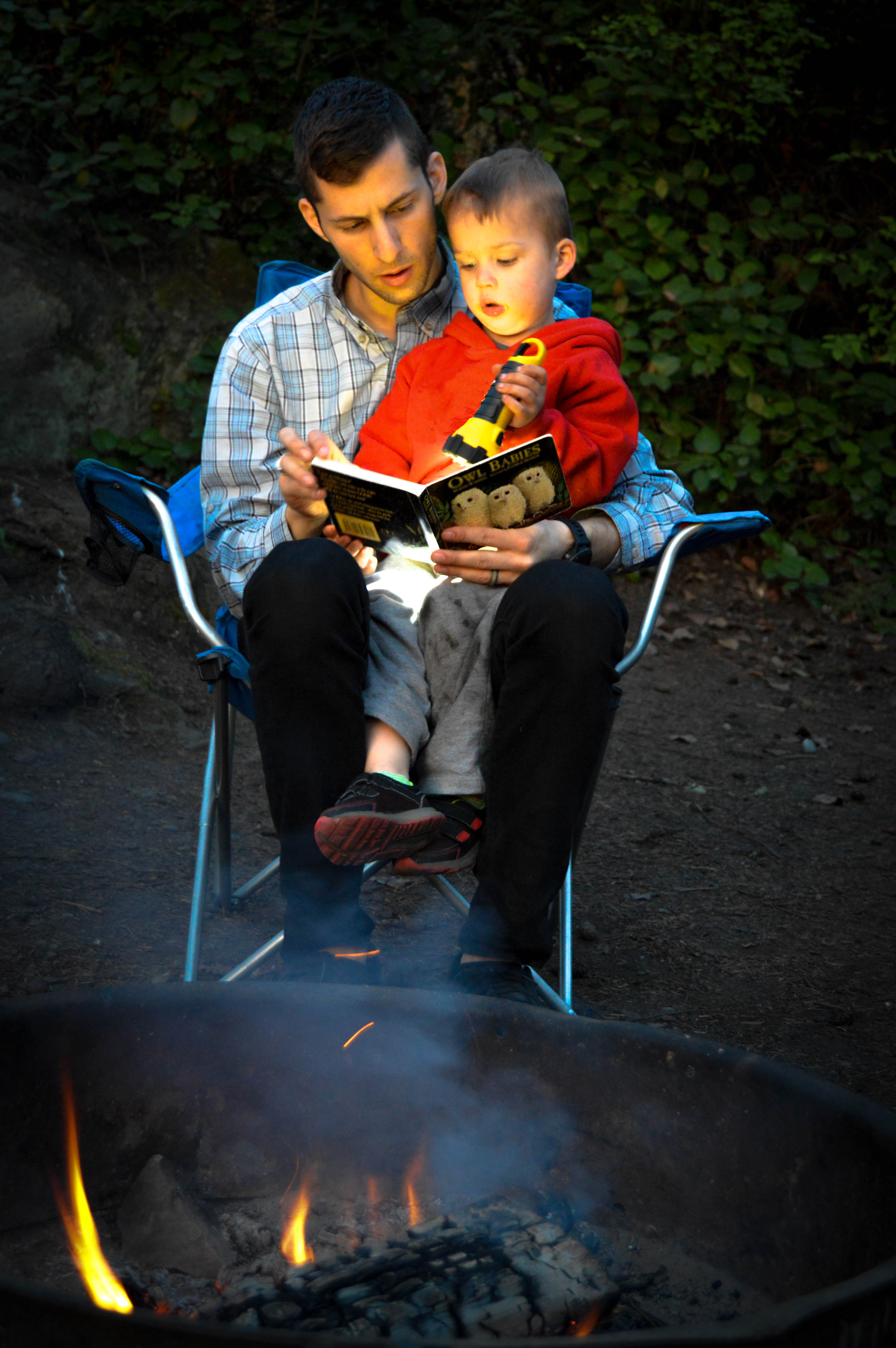 Fun Camping Activities for Toddlers #1 - Read books by flashlight