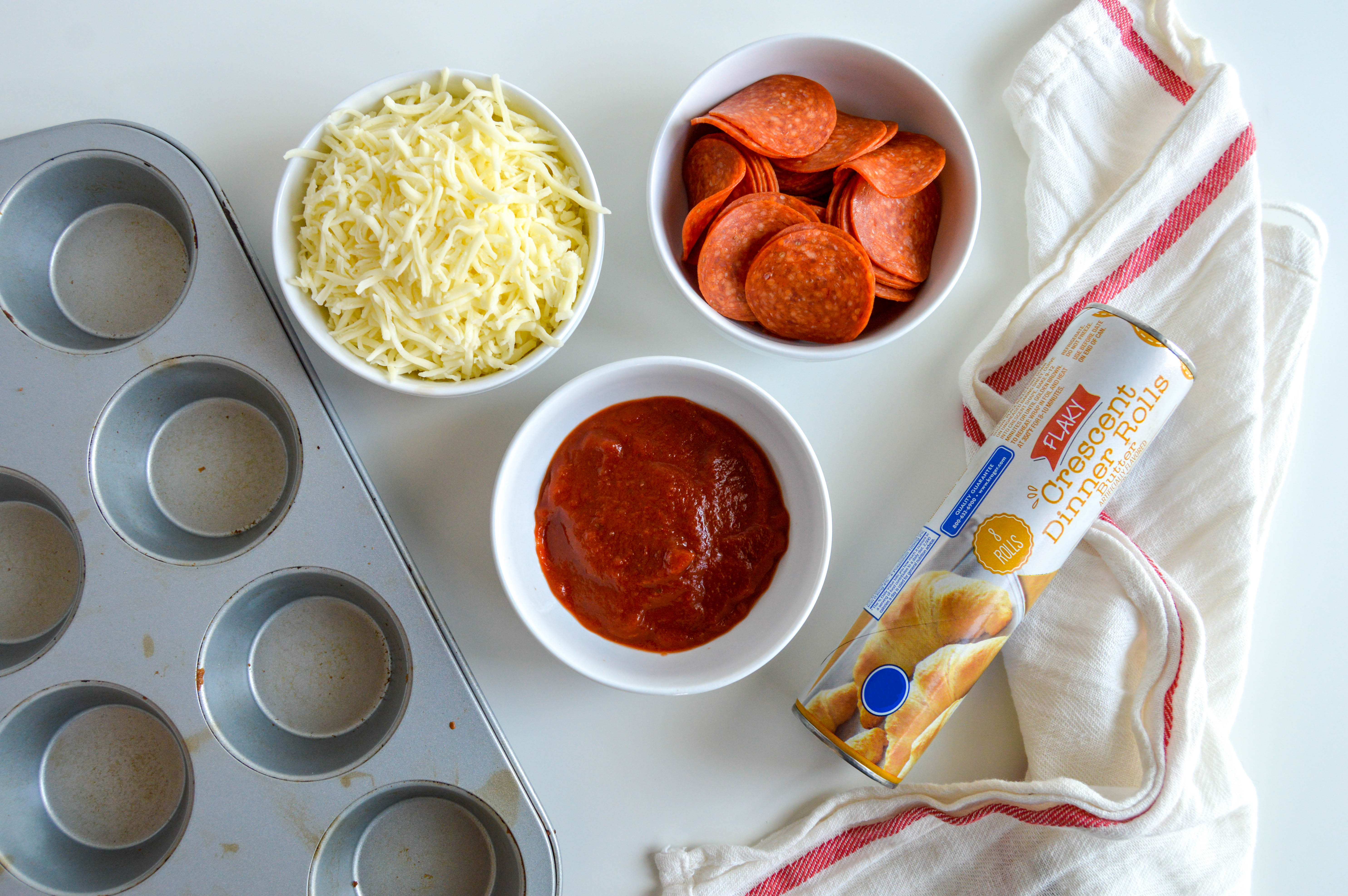 Ingredients for baking pizza muffins.