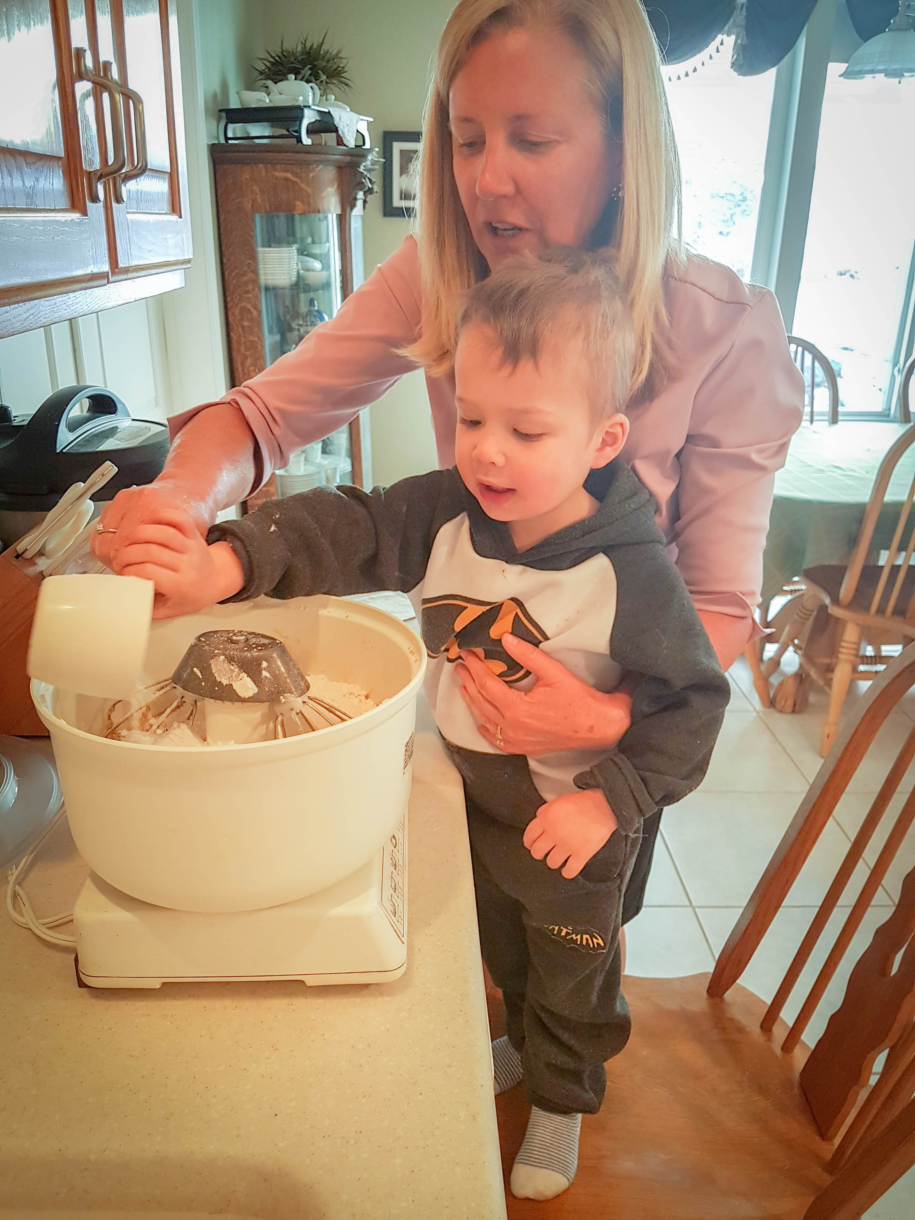 Grandma Jan making her famous milk chocolate chip cookies with my little boy.