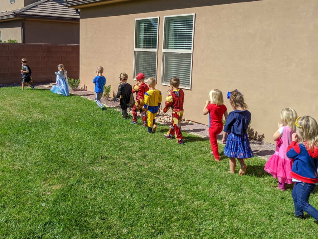 Superhero party activity - superhero parade with noise makers.