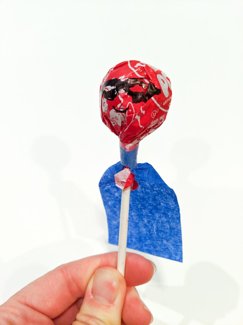 Superhero Party Favor - Lollipop sucker with cape and mask. Thank you for making my party Super.