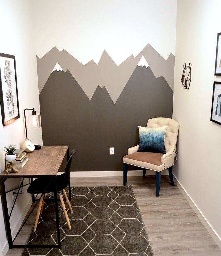 Mountain mural wall. DIY wallpaper solutions to spruce up your living room. Wall stickers and painted patterns for wallpaper hacks to use. Pros, cons, and guide for each method.
