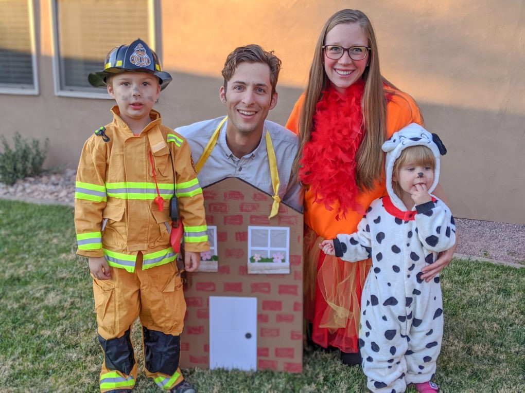 Easy and cute firefighter group costume for Halloween. Our family's fireman, Dalmatian, fire, and house. DIY instructions for how to make it.