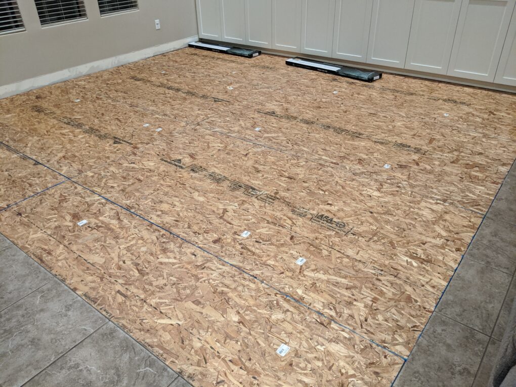 Raising carpet pad area with OSB after ripping up carpet to put down LVP flooring.